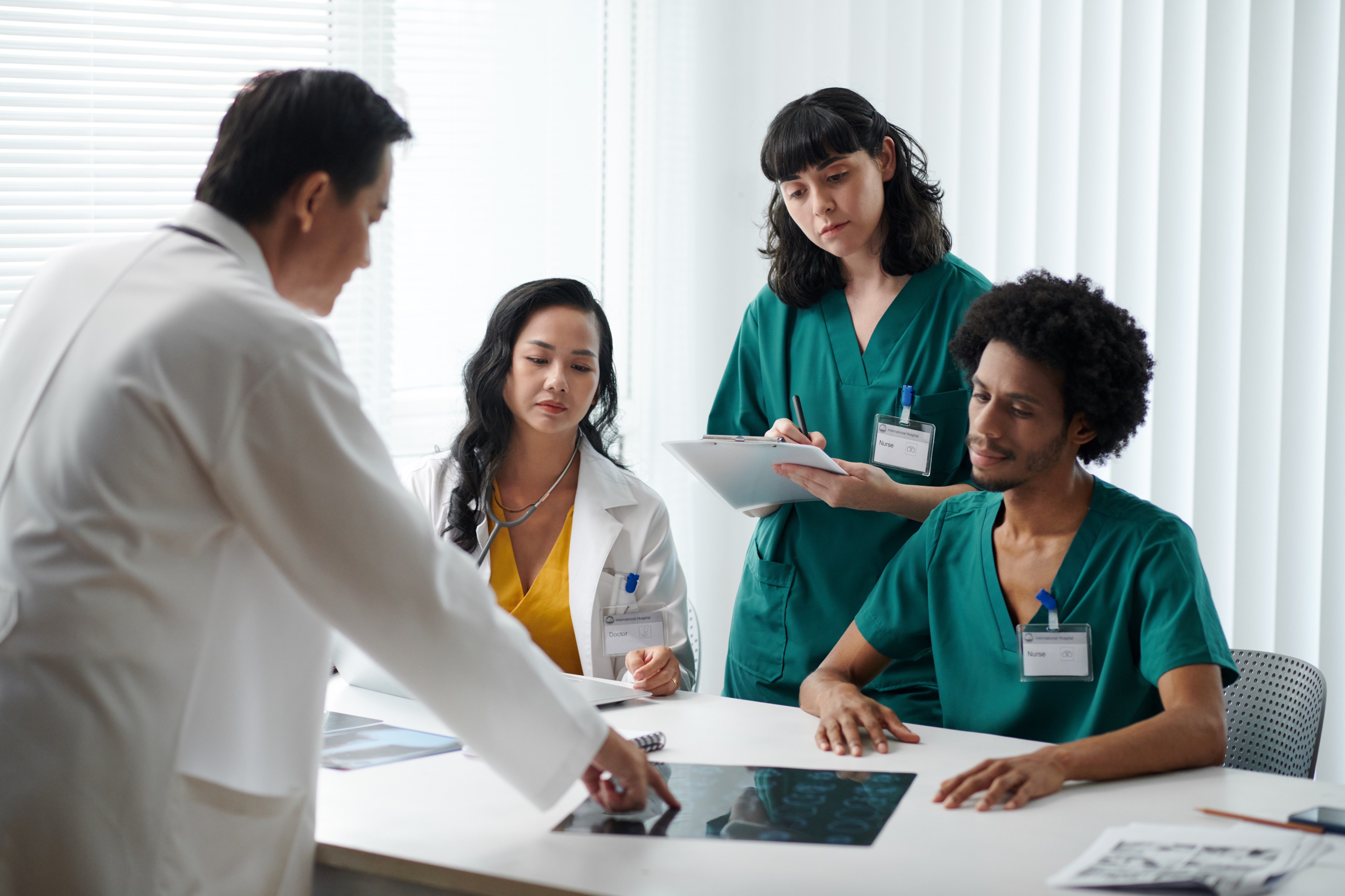Provider reviewing imaging with a patient